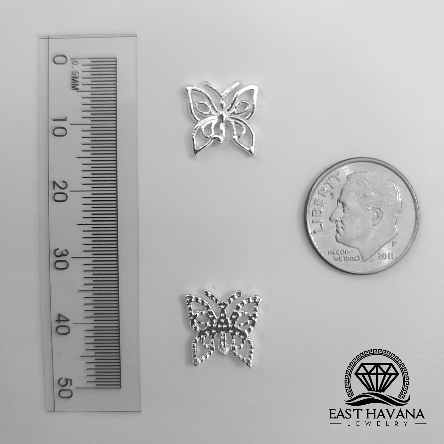 Mariposa de fundición en plata .950