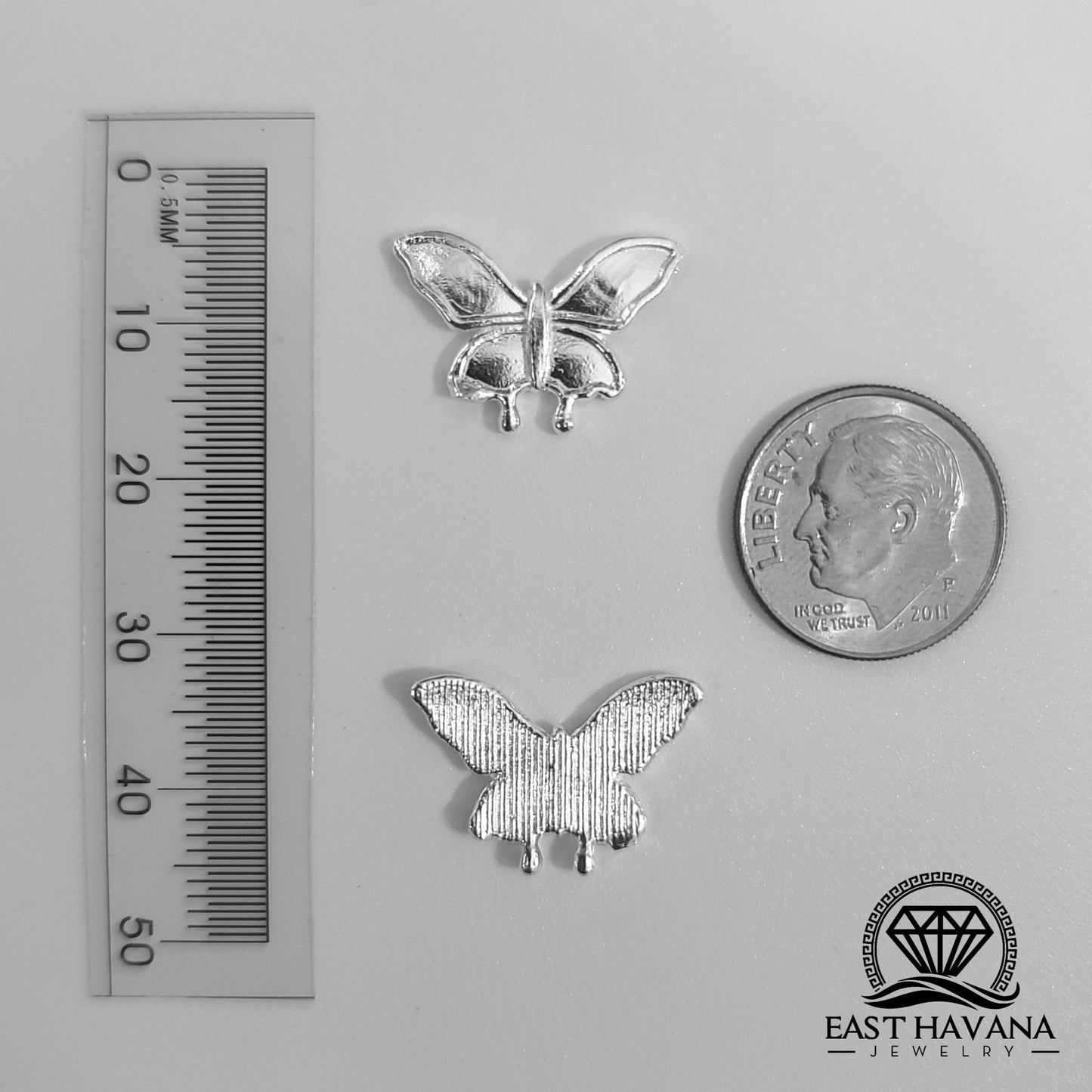 Mariposa de fundición en plata .950